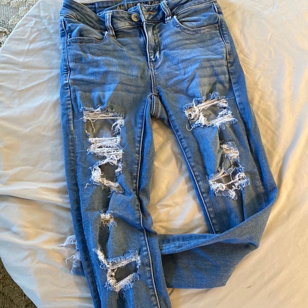 American Eagle very distressed, stretchy jeans